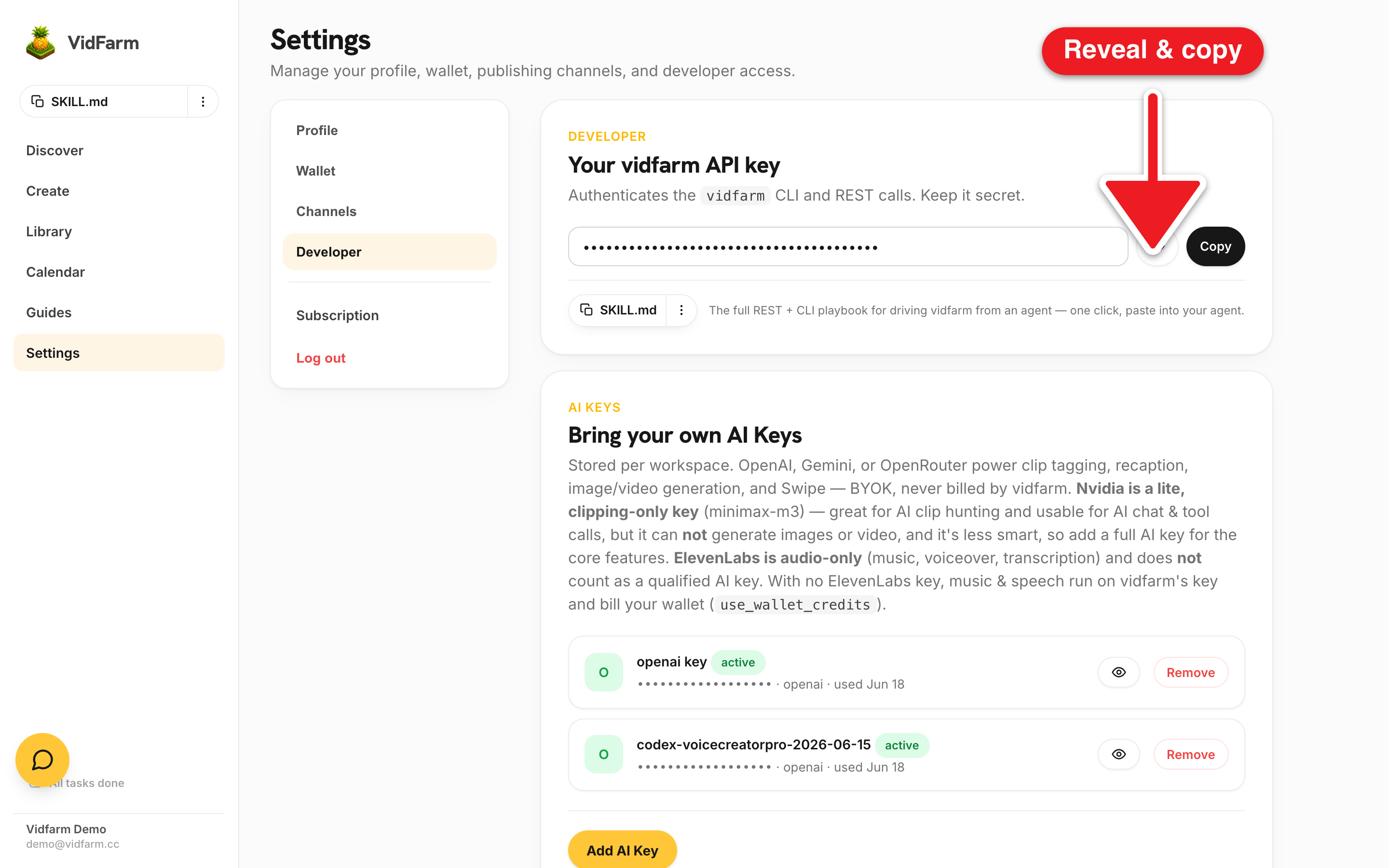 The Settings Developer tab. Left nav shows Profile, Wallet, Channels, and a highlighted Developer. The main panel shows the 'Your vidfarm API key' card with a masked (password-style) key field, an eye reveal button, and an ink 'Copy' button, and below it the SKILL.md install pill.
