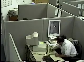 Office worker hits and kicks computer
